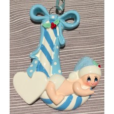 Baby cradled  in a Candy Cane  - Blue